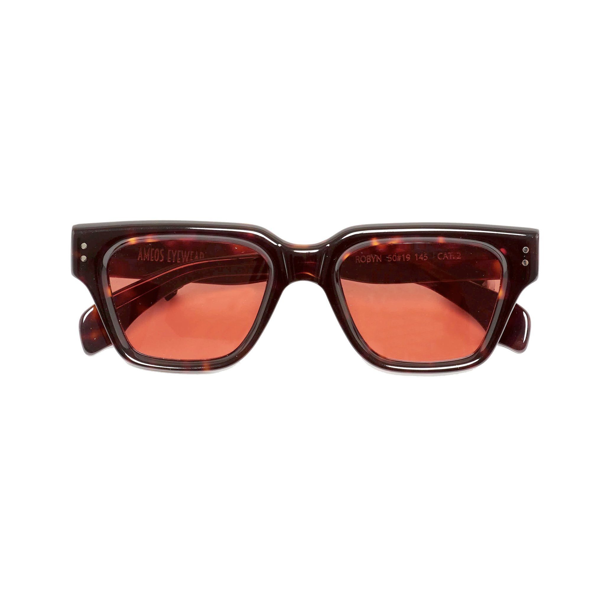 Tortoise frames sunglasses with red lenses. Front view temples crossed