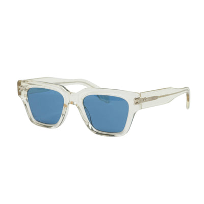 Transparent sunglasses frames with light blue lenses handmade in italy. Front view temples crossed