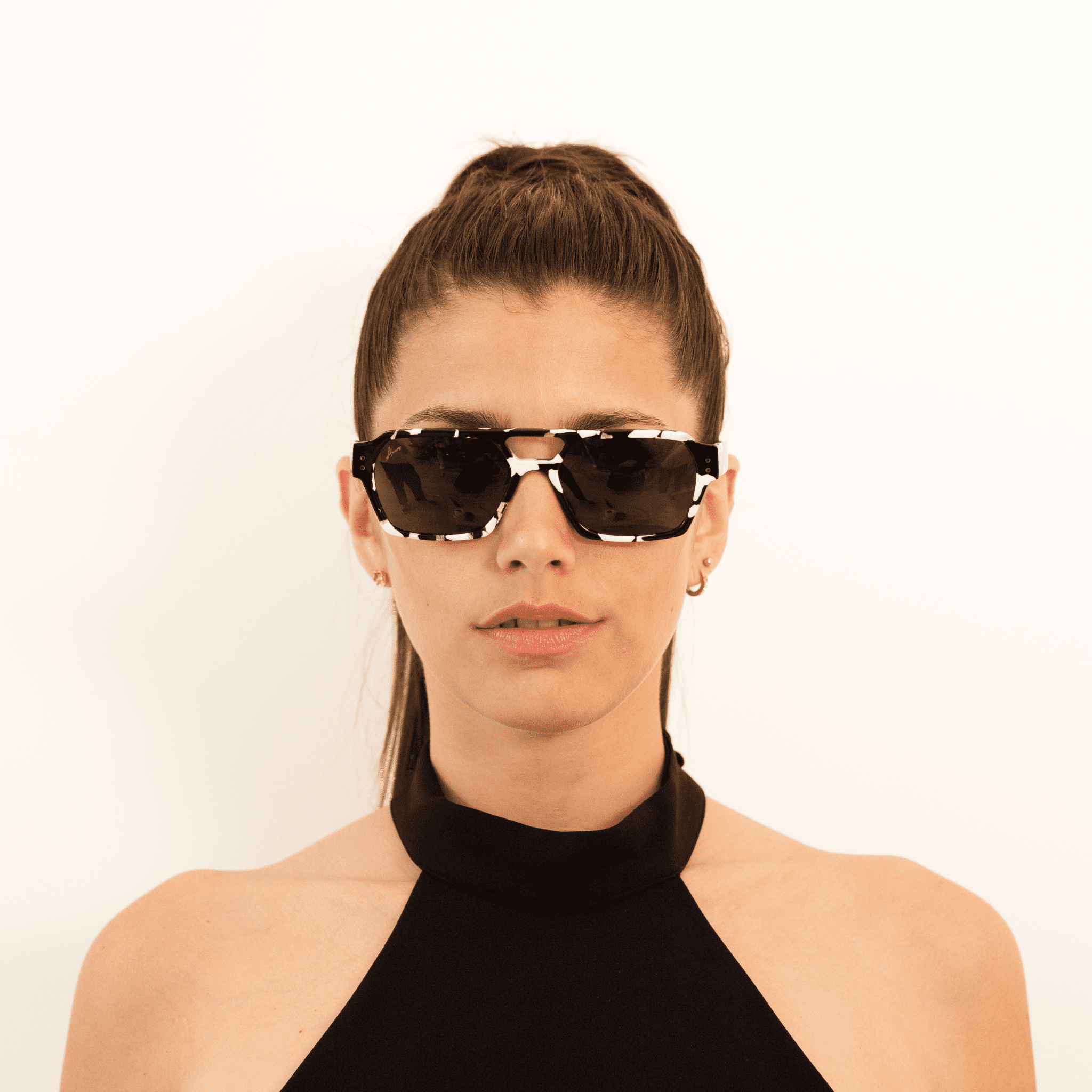 Ameos Identity collection Ego model. Black & white frames with black lenses. Genderless, gender neutral eyewear