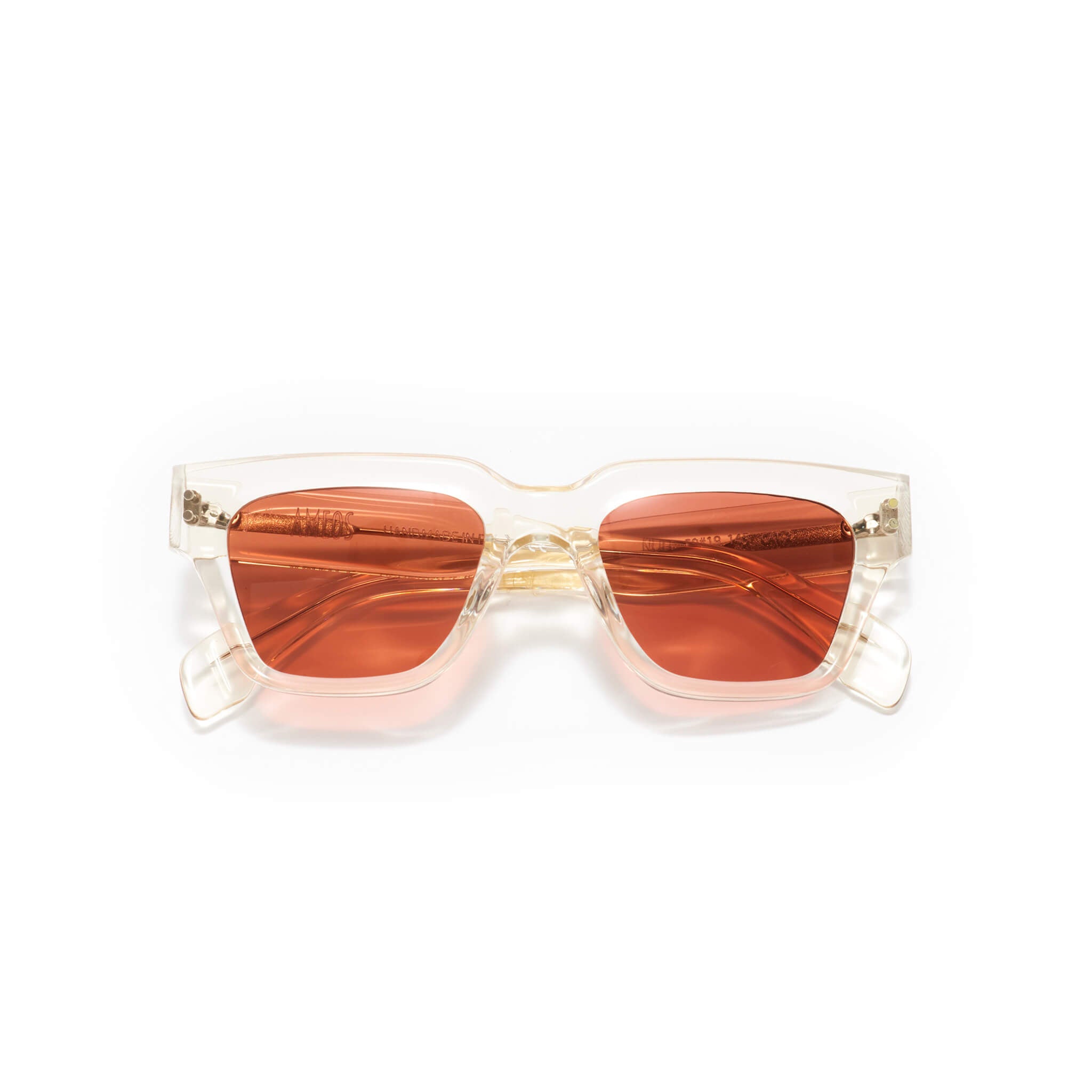 Transparent frames sunglasses with red lenses handmade in italy