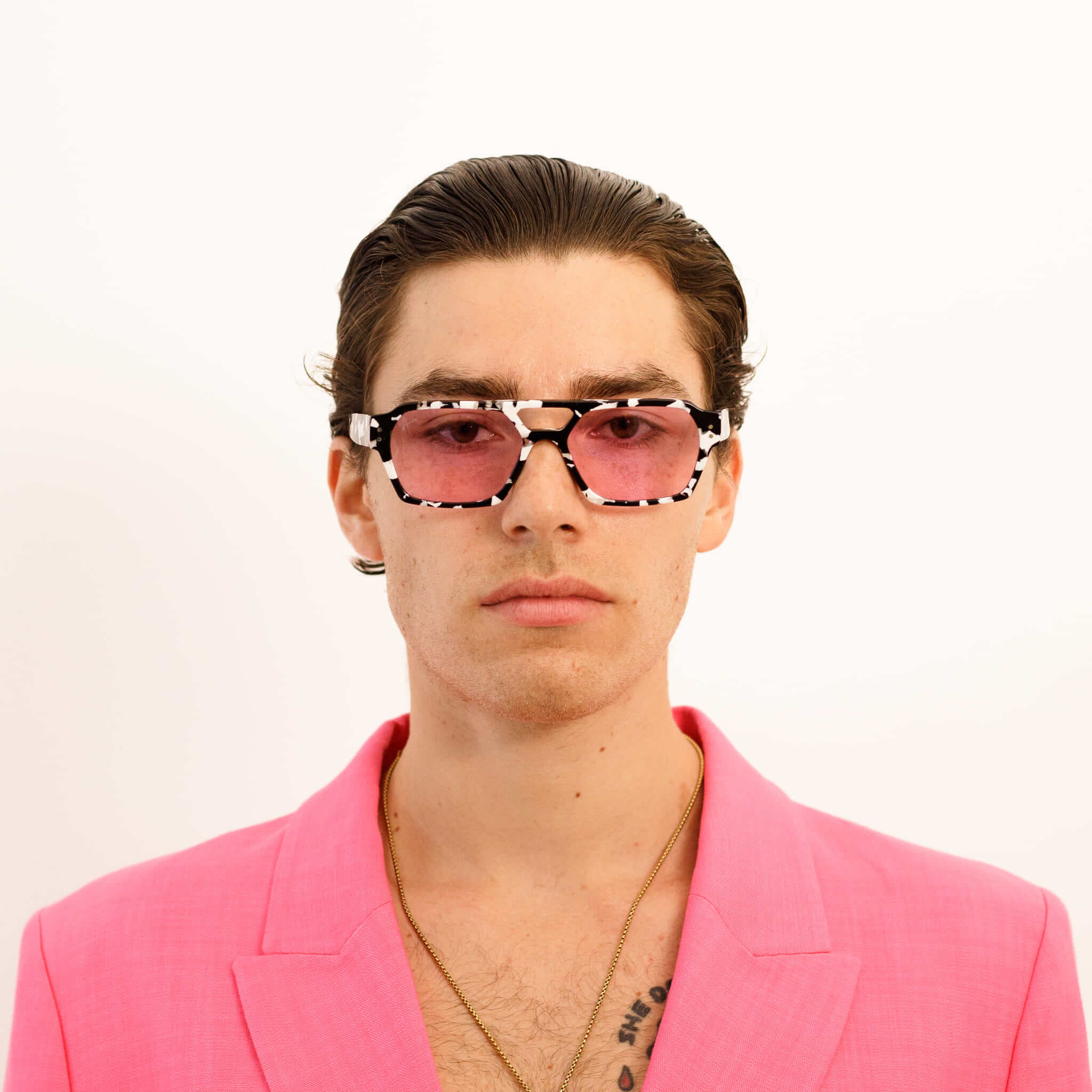 Male model with Ego sunglasses in black & White and pink