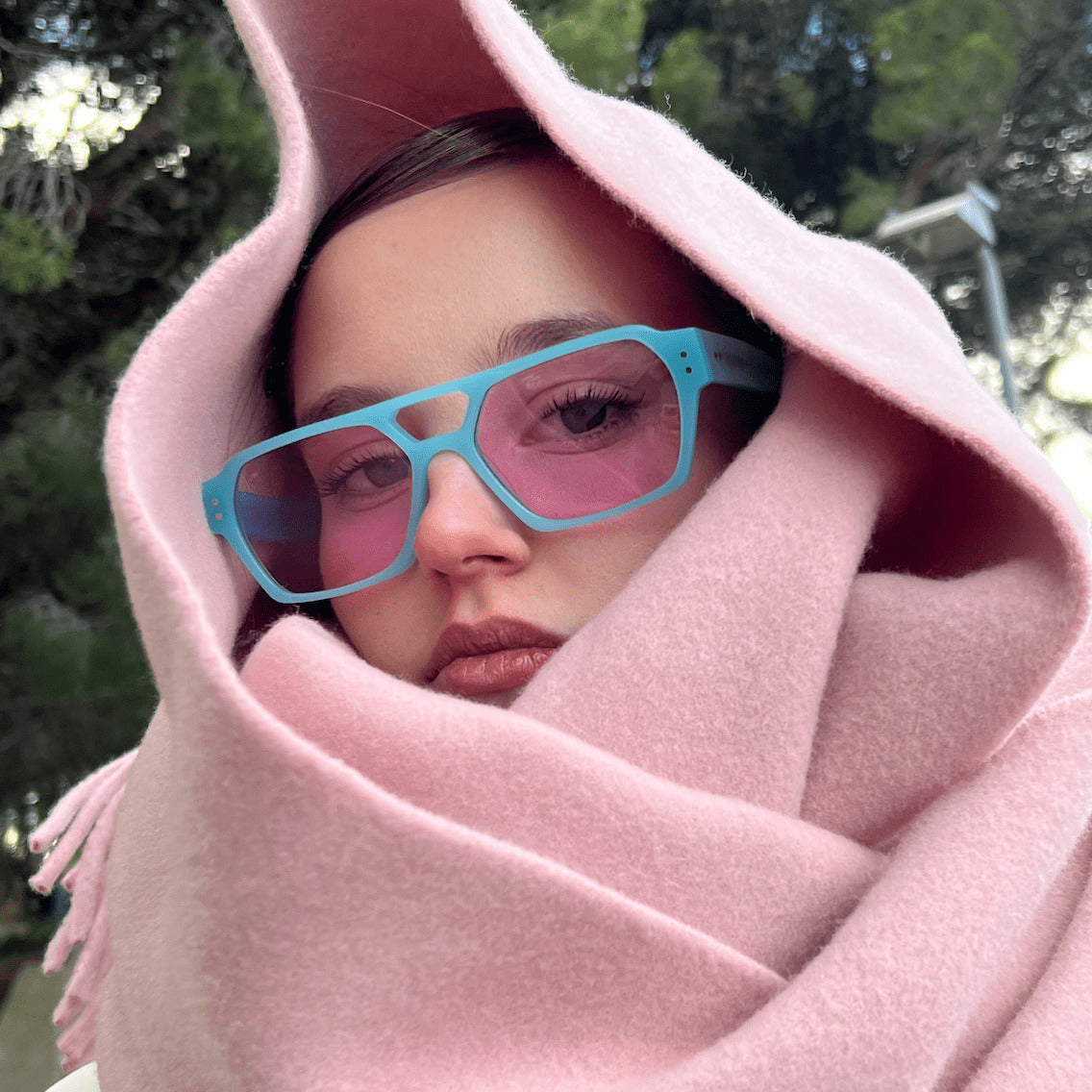 Girl wearing Ameos Ego Opal Blue Pink in a pink scarf