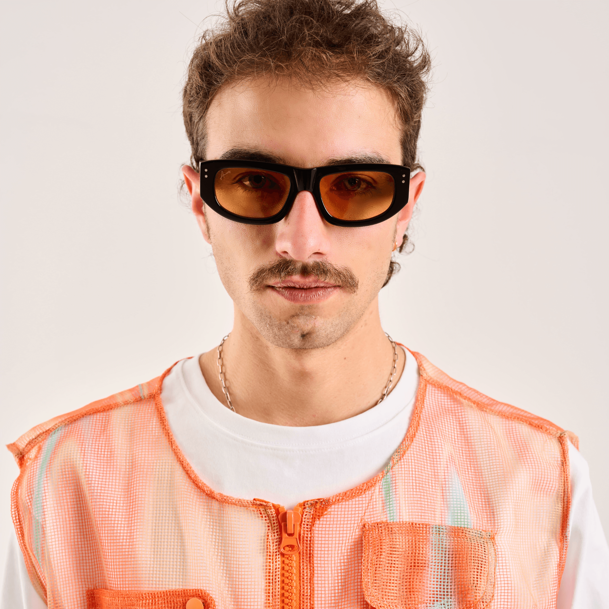 Ameos Forever collection Max model. Black frames with orange lenses. Genderless, gender neutral eyewear