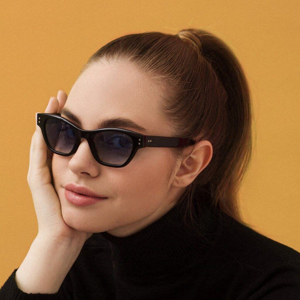 Black cat-eye sunglasses with light blue lenses handmade in italy